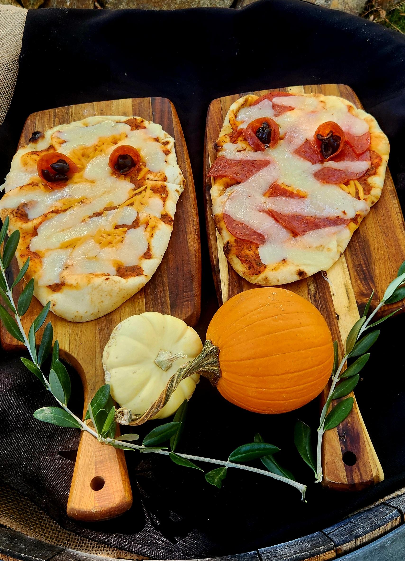 Pepperoni and cheese pizzas